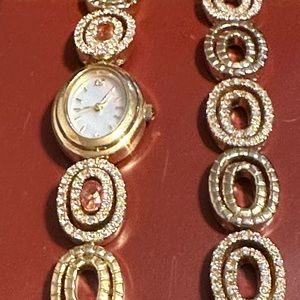 Matching watch & bracelet with case. Slightly used